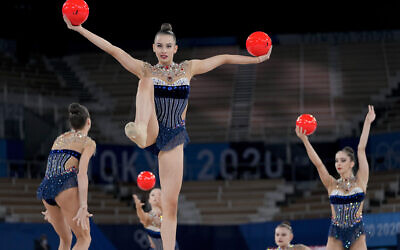 Bulgaria's rhythmic gymnastics' team, Simona Dyankova, Stefani Kiryakova, Madlen Radukanova, Laura Traets and Erika Zafirova, perform during the rhythmic gymnastics group all-around final at the 2020 Summer Olympics, Sunday, Aug. 8, 2021, in Tokyo, Japan. (AP Photo/Natacha Pisarenko)