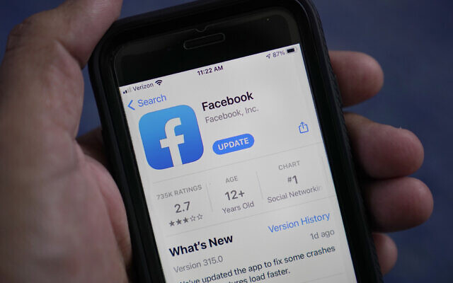 Illustrative: The Facebook app is shown on a smart phone in Surfside, Florida, April 23, 2021. (Wilfredo Lee/AP) Illustrative: The Facebook app is shown on a smart phone in Surfside, Florida, April 23, 2021. (Wilfredo Lee/AP)