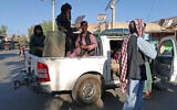 Taliban fighters patrol inside the city of Farah, capital of Farah province southwest of Kabul, Afghanistan, on August 11, 2021. (AP Photo/Mohammad Asif Khan)