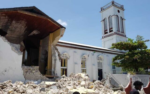 Sacred Heart church is damaged after an earthquake in Les Cayes, Haiti, on Saturday, August 14, 2021. (AP Photo/Delot Jean)