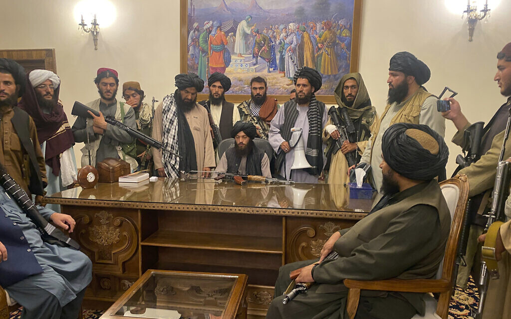 Taliban fighters take control of the Afghan presidential palace after President Ashraf Ghani fled the country, in Kabul, Afghanistan, August 15, 2021. (AP Photo/Zabi Karimi) Taliban fighters take control of the Afghan presidential palace after President Ashraf Ghani fled the country, in Kabul, Afghanistan, August 15, 2021. (AP Photo/Zabi Karimi)