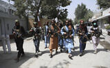 Taliban fighters patrol in the Wazir Akbar Khan neighborhood in the city of Kabul, Afghanistan, Aug. 18, 2021.  (Rahmat Gul/AP)