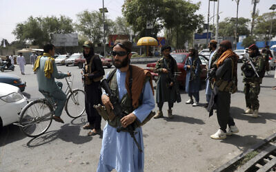 Taliban fighters patrol in the Wazir Akbar Khan neighborhood in the city of Kabul, Afghanistan, August 18, 2021. (AP Photo/Rahmat Gul)
