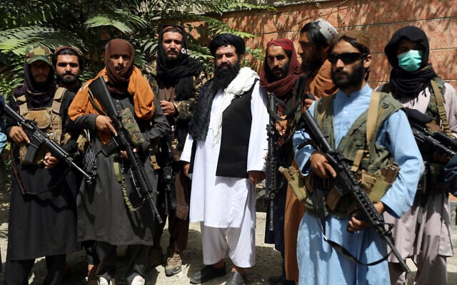 Taliban fighters pose for photograph in Wazir Akbar Khan in the city of Kabul, Afghanistan, Wednesday, Aug. 18, 2021. (AP Photo/Rahmat Gul)
