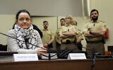 In this February 7, 2017 photo, terror suspect Beate Zschaepe sits in the court room waiting for her lawyers in Munich, Germany. (AP Photo/Matthias Schrader)