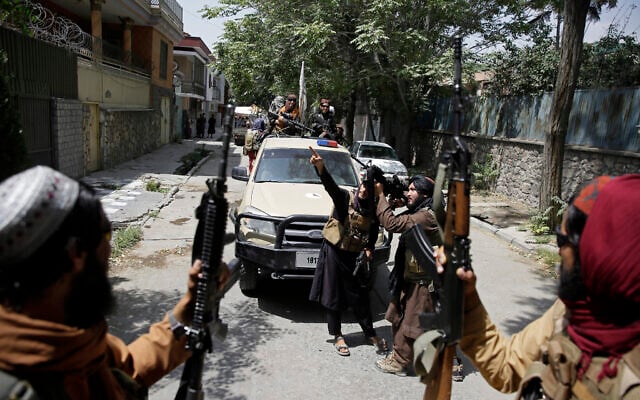 Taliban fighters patrol in Kabul, Afghanistan, on August 19, 2021. (AP/Rahmat Gul) Taliban fighters patrol in Kabul, Afghanistan, on August 19, 2021. (AP/Rahmat Gul)