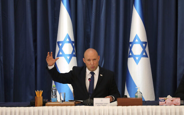 Prime Minister Naftali Bennett chairs the weekly cabinet meeting, in Jerusalem on Aug. 22, 2021. (Gil Cohen-Magen/POOL via AP) Prime Minister Naftali Bennett chairs the weekly cabinet meeting, in Jerusalem on Aug. 22, 2021. (Gil Cohen-Magen/POOL via AP)