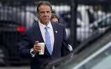 New York Governor Andrew Cuomo prepares to board a helicopter after announcing his resignation, August 10, 2021, in New York. (AP Photo/Seth Wenig)