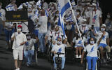 Athletes from Israel enter the stadium during the opening ceremony for the 2020 Paralympics at the National Stadium in Tokyo, Tuesday, Aug. 24, 2021. (AP Photo/Emilio Morenatti)