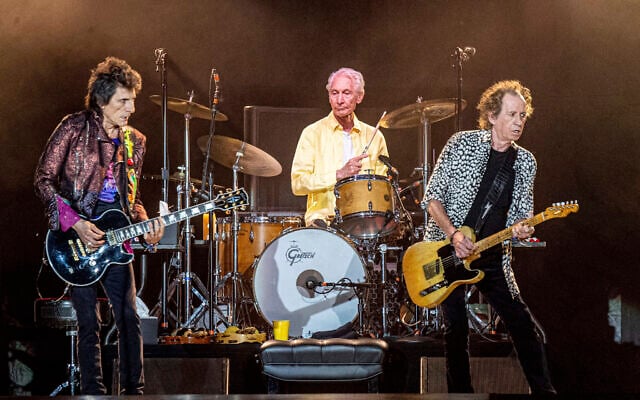 Ronnie Wood, from left, Charlie Watts and Keith Richards of The Rolling Stones perform on  July 15, 2019, in New Orleans. Watts' publicist, Bernard Doherty, said Watts passed away peacefully in a London hospital surrounded by his family on Tuesday, Aug. 24, 2021. He was 80.  (Photo by Amy Harris/Invision/AP, File)
