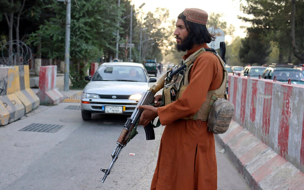 A Taliban fighter stands guard at a checkpoint, in Kabul, Afghanistan, on August 25, 2021. (AP Photo/Khwaja Tawfiq Sediqi) A Taliban fighter stands guard at a checkpoint, in Kabul, Afghanistan, on August 25, 2021. (AP Photo/Khwaja Tawfiq Sediqi)