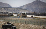 US paratroopers assigned to the 1st Brigade Combat Team, 82nd Airborne Division, conduct security as they continue to help facilitate evacuations at Hamid Karzai International Airport in Kabul, Afghanistan, August 25, 2021. (Department of Defense via AP)