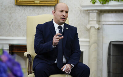 Israeli Prime Minister Naftali Bennett speaks as he meets with President Joe Biden in the Oval Office of the White House, on Friday, August 27, 2021, in Washington, DC. (AP Photo/Evan Vucci)