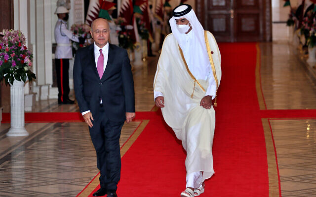 Iraqi President Barham Salih, left, welcomes Qatar's Emir Sheikh Tamim bin Hamad Al Thani in Baghdad's Presidential Palace, on August 28, 2021. (AP Photo/Khalid Mohammed) Iraqi President Barham Salih, left, welcomes Qatar's Emir Sheikh Tamim bin Hamad Al Thani in Baghdad's Presidential Palace, on August 28, 2021. (AP Photo/Khalid Mohammed)
