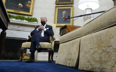 In this August 27, 2021 photo, US President Joe Biden listens as he meets with Israeli Prime Minister Naftali Bennett in the Oval Office of the White House in Washington. (AP/Evan Vucci)