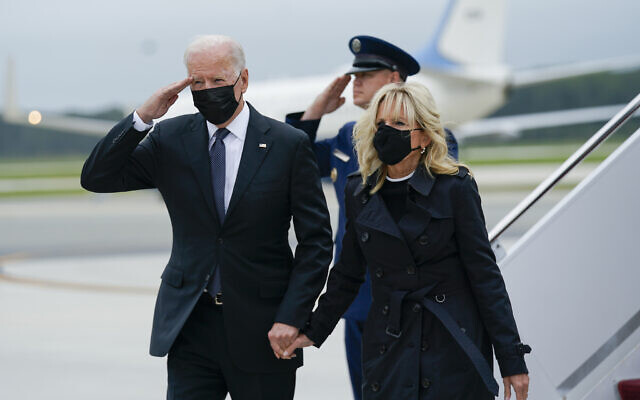 US President Joe Biden returns a salute as he and first lady Jill Biden arrive at Dover Air Force Base, Delaware, August 29, 2021. (Manuel Balce Ceneta/AP) US President Joe Biden returns a salute as he and first lady Jill Biden arrive at Dover Air Force Base, Delaware, August 29, 2021. (Manuel Balce Ceneta/AP)