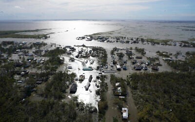 Homes are flooded in the aftermath of Hurricane Ida, August 30, 2021, in Lafitte, Louisiana. (AP Photo/David J. Phillip)