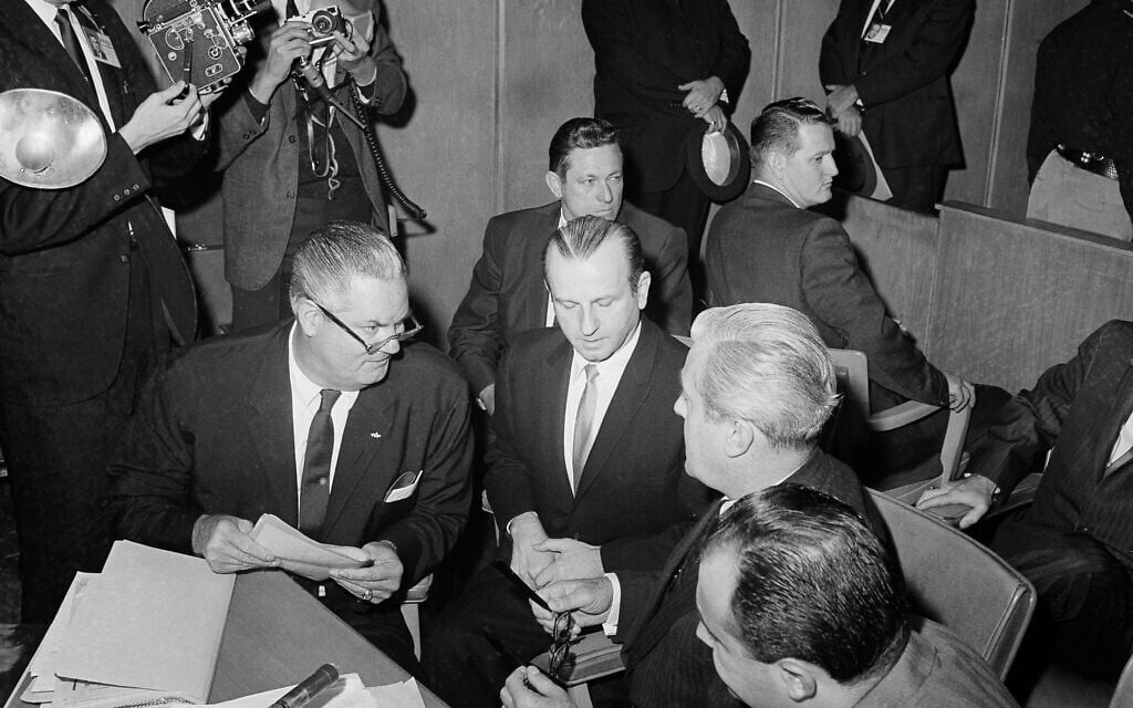 Jack Ruby, seated, second from left, with his attorneys, including Sam Houston Clinton, at his sanity hearing in Dallas, Texas, October 15, 1965. (AP Photo/Dave Taylor)