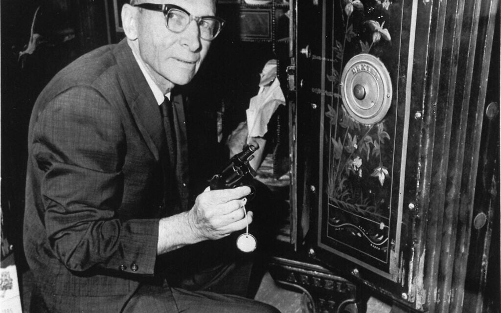 Clerk Glenn Haynes of the Texas Court of Criminal Appeals in Austin, June 24, 1966, removes from a safe the gun which Jack Ruby used to kill accused assassin of John F. Kennedy. (AP Photo/Ted Powers)