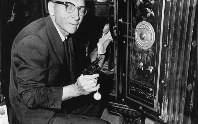Clerk Glenn Haynes of the Texas Court of Criminal Appeals in Austin, June 24, 1966, removes from a safe the gun which Jack Ruby used to kill accused assassin of John F. Kennedy. (AP Photo/Ted Powers)