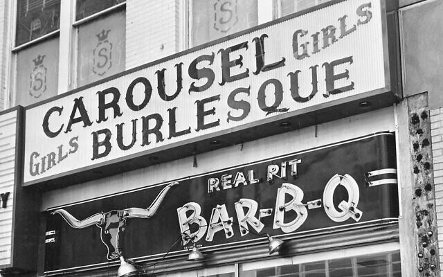 The entrance and marquee of the Carousel burlesque club, located on the second floor on Commerce Street in Dallas, Texas, is shown on November 24, 1963, the day the club's operator Jack Ruby shot John F. Kennedy's accused assassin, Lee Harvey Oswald.  (AP Photo)