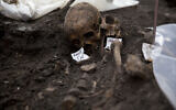Illustrative: Two adult skulls lie next to each other at an archaeological excavation site in London, March 6, 2015. (AP/Matt Dunham)