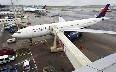 Illustrative: A Delta aircraft is seen on Schiphol airport in Amsterdam, Wednesday, Aug. 7, 2013.  (AP Photo/Evert Elzinga)