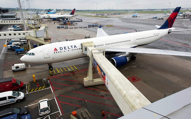 Illustrative: A Delta aircraft is seen on Schiphol airport in Amsterdam, Wednesday, Aug. 7, 2013. (AP Photo/Evert Elzinga) Illustrative: A Delta aircraft is seen on Schiphol airport in Amsterdam, Wednesday, Aug. 7, 2013. (AP Photo/Evert Elzinga)
