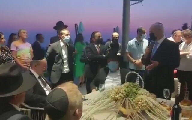 Opposition leader Benjamin Netanyahu (R) apologizes to ultra-Orthodox MKs after releasing a statement on the Sabbath, August 8, 2021. (Video screenshot) Opposition leader Benjamin Netanyahu (R) apologizes to ultra-Orthodox MKs after releasing a statement on the Sabbath, August 8, 2021. (Video screenshot)