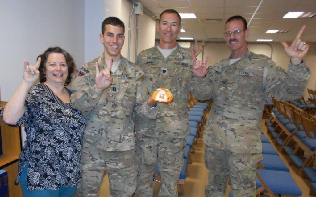 Brett Sander (second from left) with other Jewish soldiers and a Christian chaplain (second from R) in Afghanistan (courtesy)
