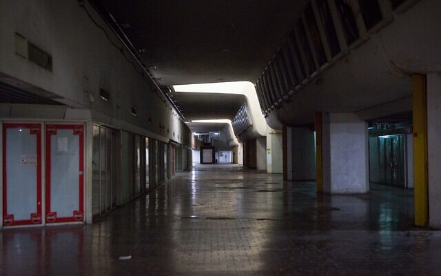 Illustrative: The empty halls of the first floor of the Central Bus Station in Tel Aviv on July 26, 2019. (Miriam Alster/FLASH90) Illustrative: The empty halls of the first floor of the Central Bus Station in Tel Aviv on July 26, 2019. (Miriam Alster/FLASH90)