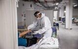 Medical staff in the coronavirus ward of the Herzog Medical Center in Jerusalem, on July 29, 2021. (Yonatan Sindel/Flash90)