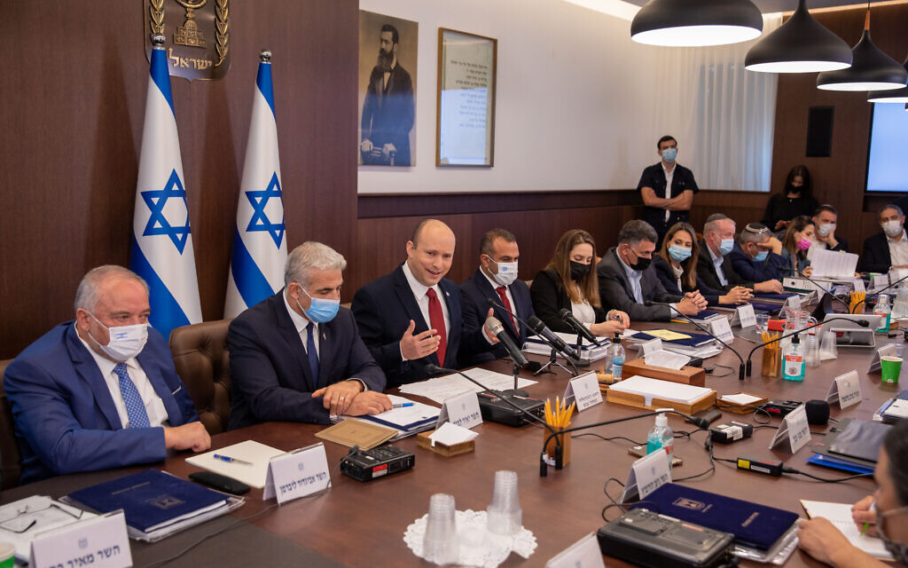 Prime Minister Naftali Bennett, center, leads a cabinet meeting at the Prime Minister's Office in Jerusalem on August 1, 2021. (Emil Salman/Flash90) Prime Minister Naftali Bennett, center, leads a cabinet meeting at the Prime Minister's Office in Jerusalem on August 1, 2021. (Emil Salman/Flash90)