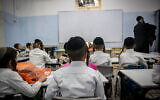 Ultra-orthodox Jewish children at a school founded by Rabbi Shmuel Stern in Jerusalem on August 9, 2021. (Yonatan Sindel/Flash90)