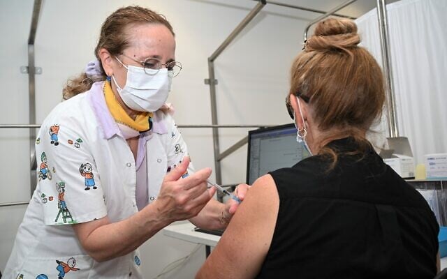 Illustrative image: An Israeli woman receives a coronavirus vaccine booster shot; Oramed is aiming at introducing oral vaccines instead (Michael Giladi/Flash90) Illustrative image: An Israeli woman receives a coronavirus vaccine booster shot; Oramed is aiming at introducing oral vaccines instead (Michael Giladi/Flash90)