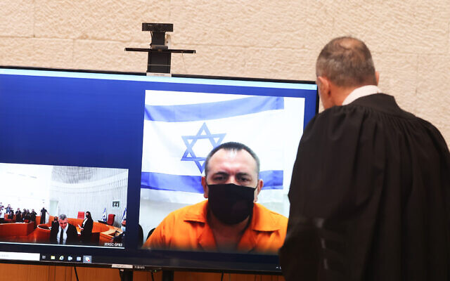 Roman Zadorov is seen an an appeal hearing at the Supreme Court in jerusalem, on August 20, 2021. (Yonatan Sindel/Flash90) Roman Zadorov is seen an an appeal hearing at the Supreme Court in jerusalem, on August 20, 2021. (Yonatan Sindel/Flash90)