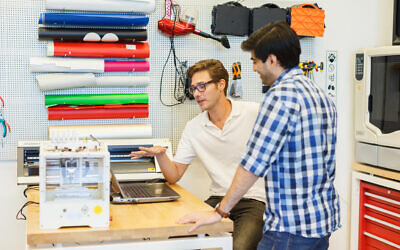 HCI students inside milab, IDC Herzliya's research and prototyping lab