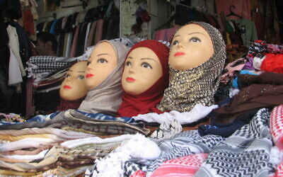 Illustrative photo of Hijabs at a market place. (Wikimedia Commons via JTA)