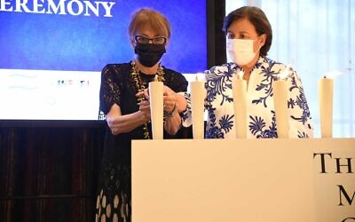 Ankie Spitzer (R) at the Israeli memorial for the victims of the 1972 Munich Olympics massacre, in Japan on August 1, 2021 (Israel Olympic Committee)