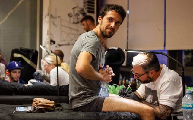 Healing Ink, a project of Artists 4 Israel, provides free tattoos to those injured in terrorist and antisemitic attacks. (Dillon Meyer)