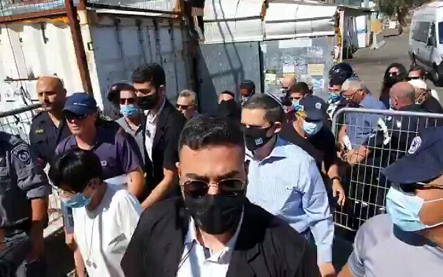 Members of the state commission of inquiry into the tragedy at Mount Meron tour the site on August 2, 2021. (Screenshot/Twitter) Members of the state commission of inquiry into the tragedy at Mount Meron tour the site on August 2, 2021. (Screenshot/Twitter)