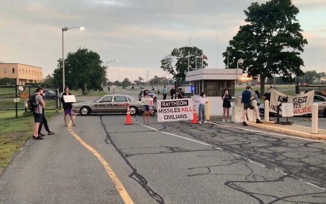 Screen capture from video of protestors outside a plant of US defense contractor Raytheon in Rhode Island, on August 12, 2021. (Twitter) Screen capture from video of protestors outside a plant of US defense contractor Raytheon in Rhode Island, on August 12, 2021. (Twitter)