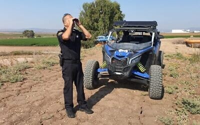 Police forces at the scene of the alleged murder of a 46-year-old woman from Nof Hagalil, near the Yarden Haharari section of the Jordan River, on August 7, 2021 (Israel Police)
