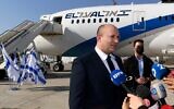 Prime Minister Naftali Bennett speaks to reporters before departing Ben Gurion Airport for Washington on August 24, 2021 (Avi Ohayon/GPO)