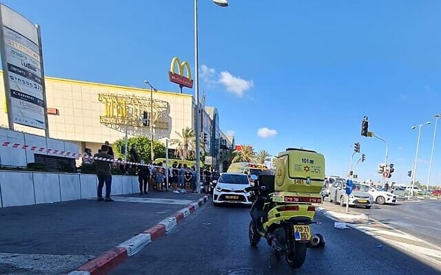 The scene of a deadly shooting outside a shopping mall in Rishon LeZion on August 18, 2021 (Magen David Adom) The scene of a deadly shooting outside a shopping mall in Rishon LeZion on August 18, 2021 (Magen David Adom)