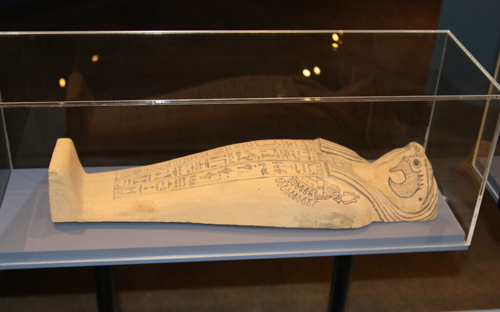 This ancient Egyptian sarcophagus for a corn mummy features a falcon head, on display at the Bible Lands Museum's exhibit 'Early Birds.' (Shmuel Bar-Am)