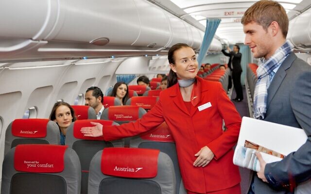Illustrative: An Austrian Airlines flight attendant directing a passenger to his seat. (Austrian Airlines, CC BY-SA 2.0, Wikimedia Commons) Illustrative: An Austrian Airlines flight attendant directing a passenger to his seat. (Austrian Airlines, CC BY-SA 2.0, Wikimedia Commons)