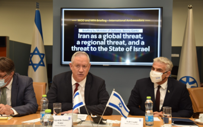 Defense Minister Benny Gantz (C) and Foreign Minister Yair Lapid (R) addressing foreign ambassadors at the Foreign Ministry in Jerusalem, August 4, 2021. (Israel Foreign Ministry)