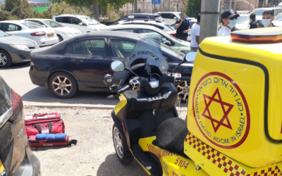A Magen David Adom ambulance service vehicle at scene where a 6-year-old boy was found lifeless in a hot car, in the southern Sdot Negev regional council, August 31, 2021. (Magen David Adom)