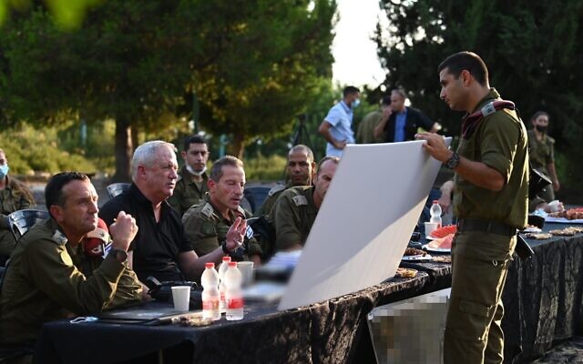 Defense Minister Benny Gantz speaks with military officials in the IDF northern command, on August 10, 2021. (Ariel Hermoni/Defense Ministry) Defense Minister Benny Gantz speaks with military officials in the IDF northern command, on August 10, 2021. (Ariel Hermoni/Defense Ministry)